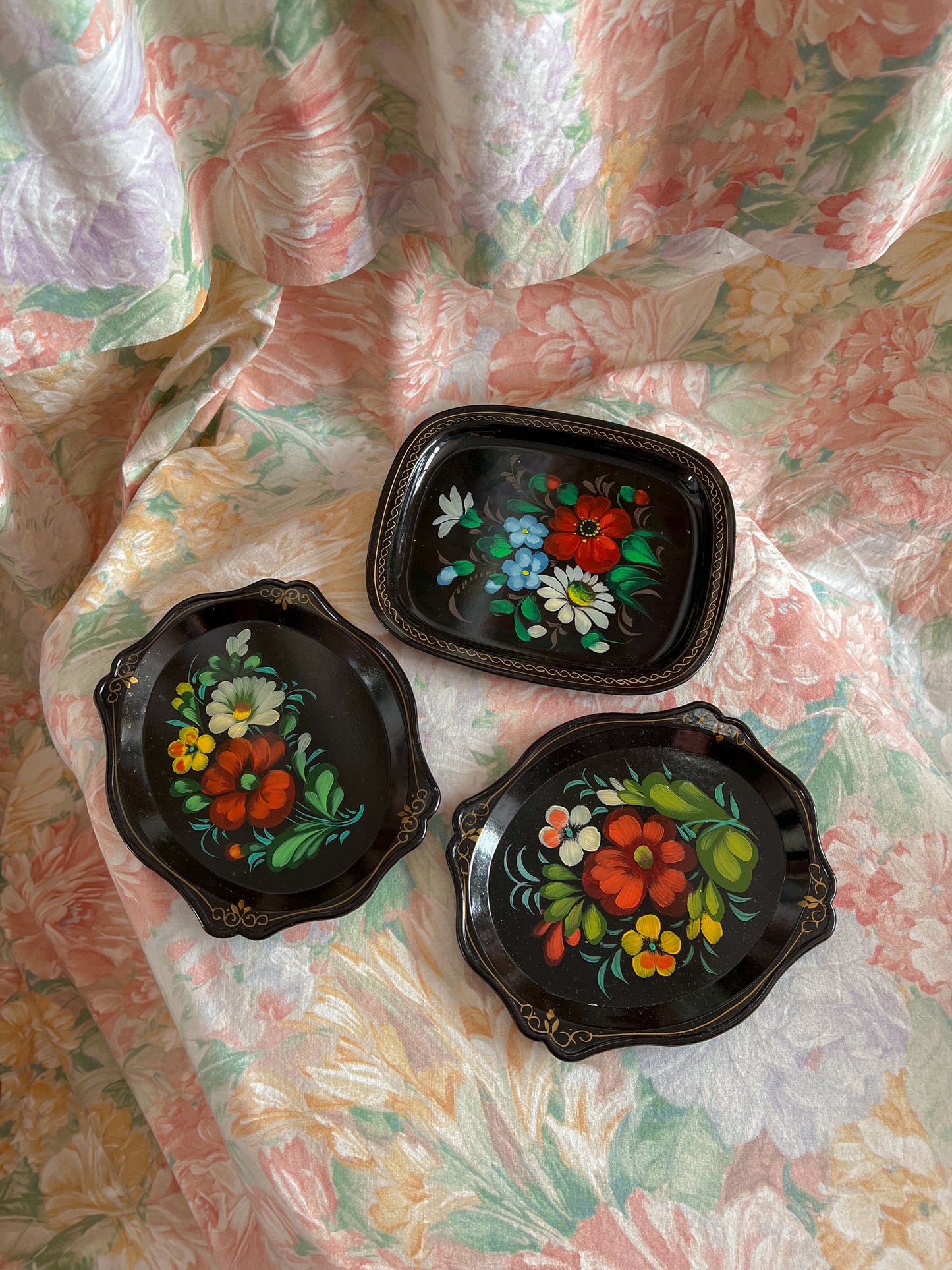 Set of three vintage folk art trays