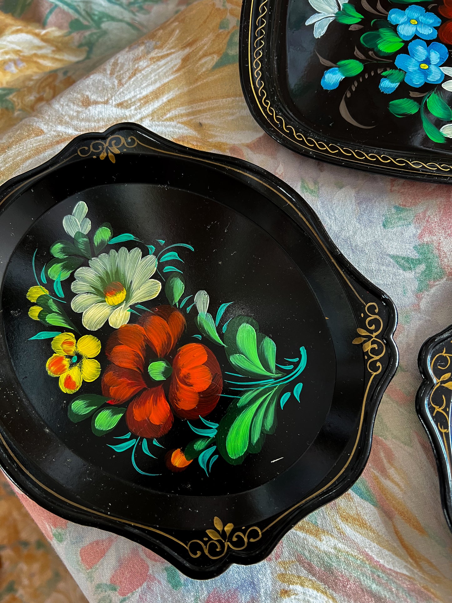 Set of three vintage folk art trays