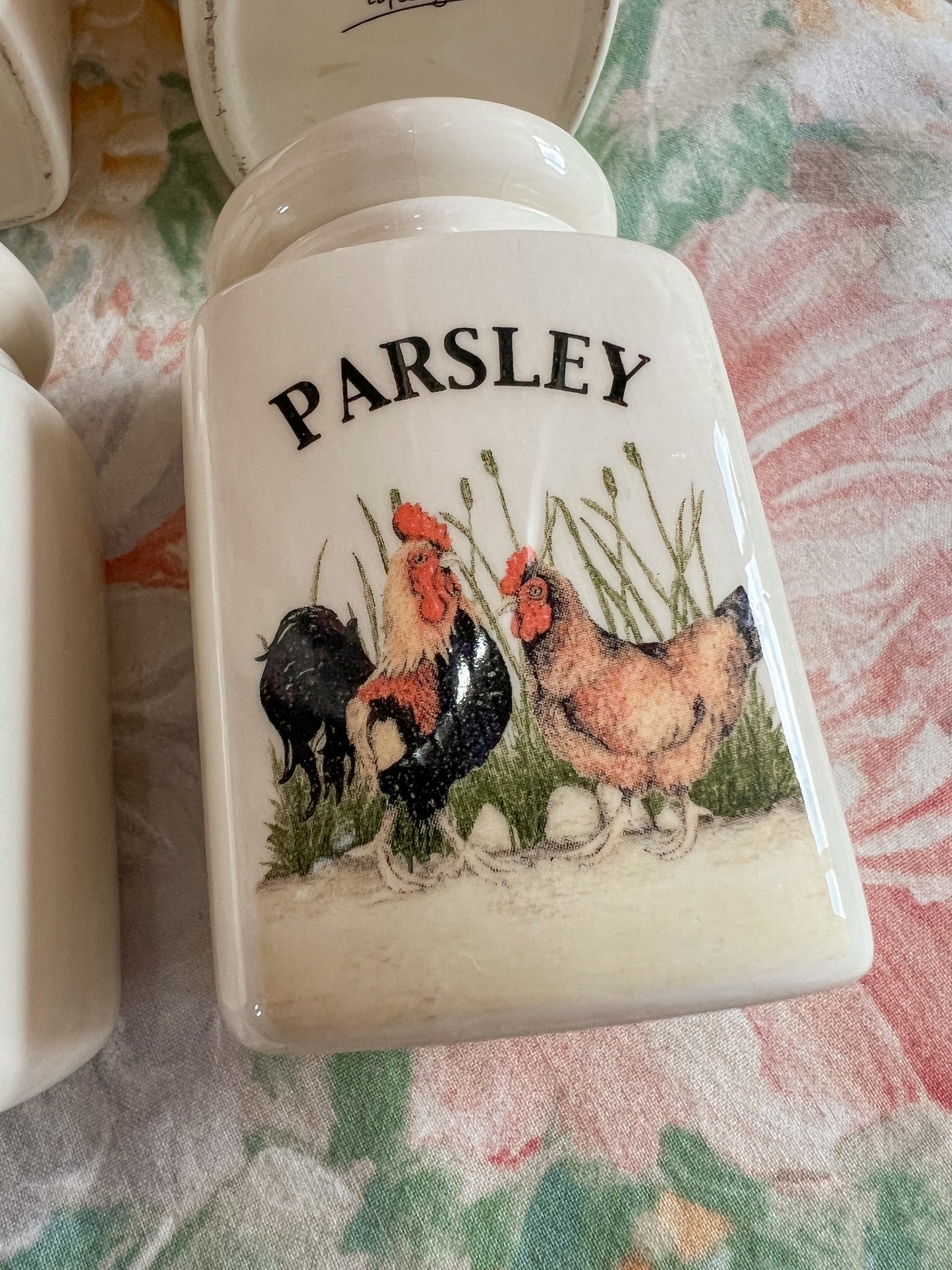 A set of 6 country kitchen herb jars.