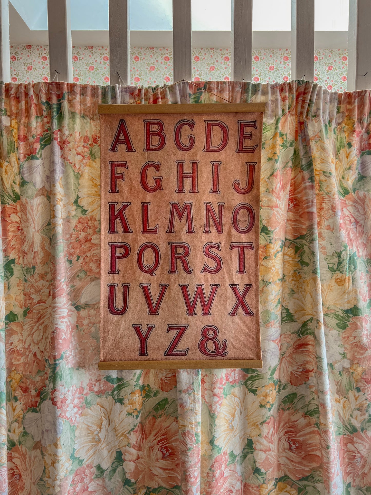 Vintage fabric alphabet wall hanging.
