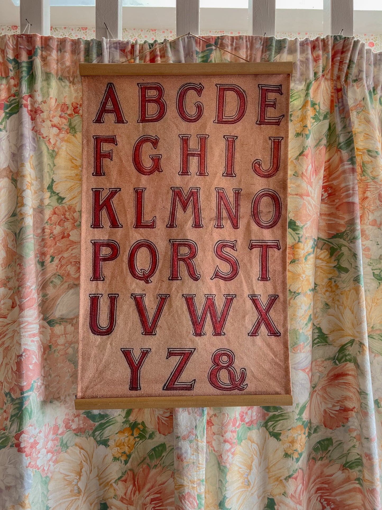 Vintage fabric alphabet wall hanging.