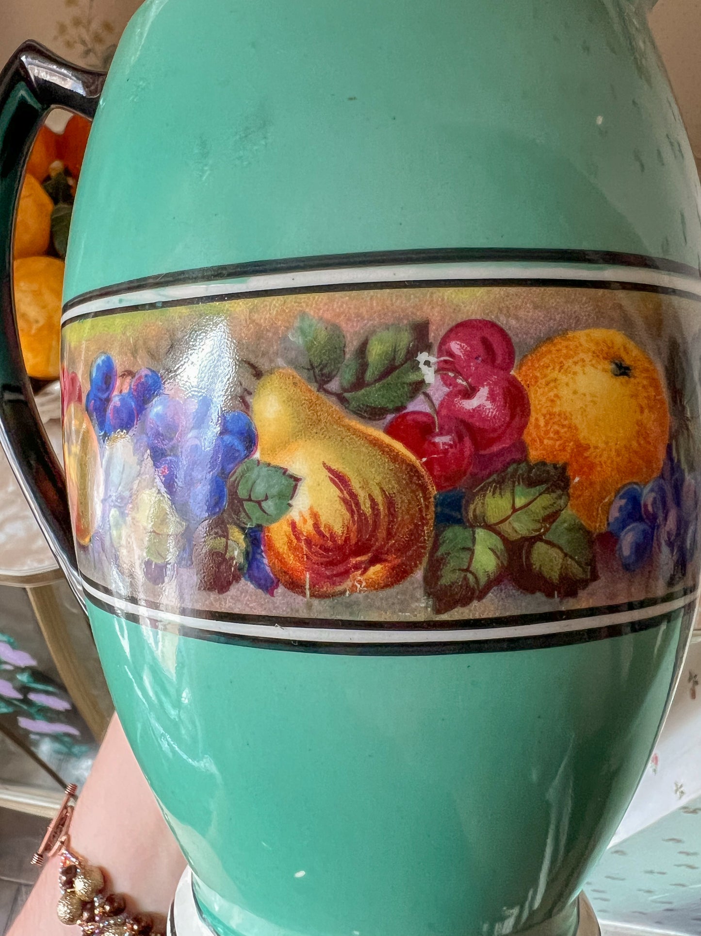 Vintage ceramic pitcher vase.