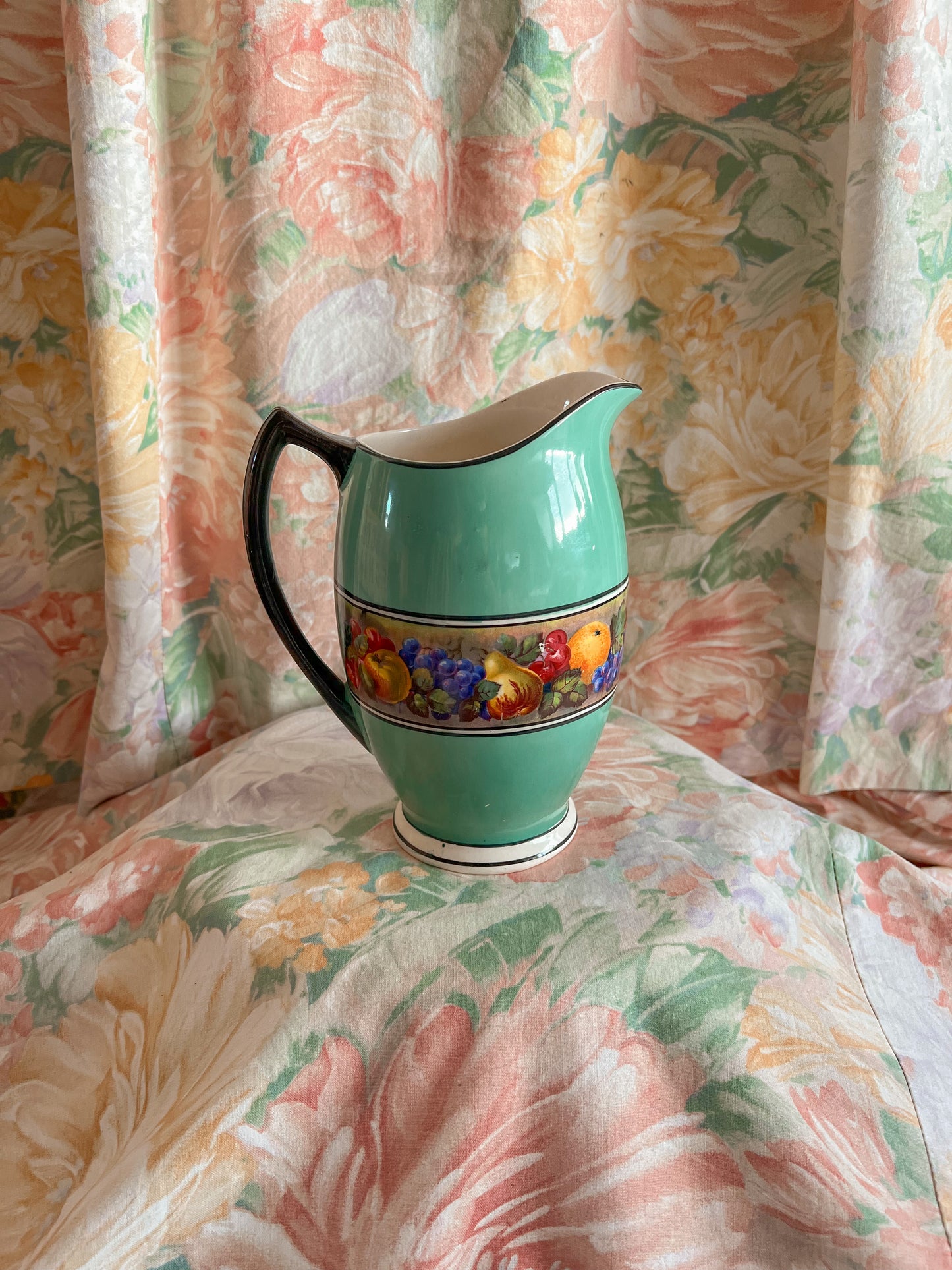 Vintage ceramic pitcher vase.