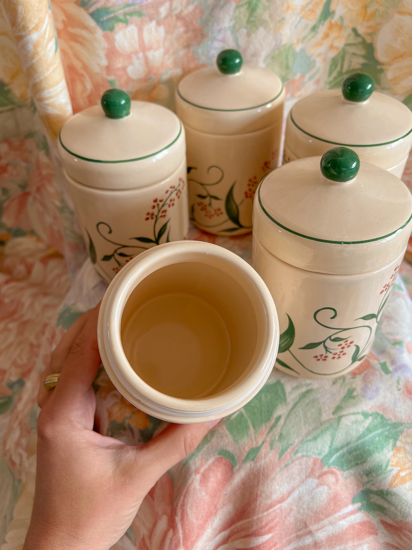 Set of five vintage kitchen canister jars.