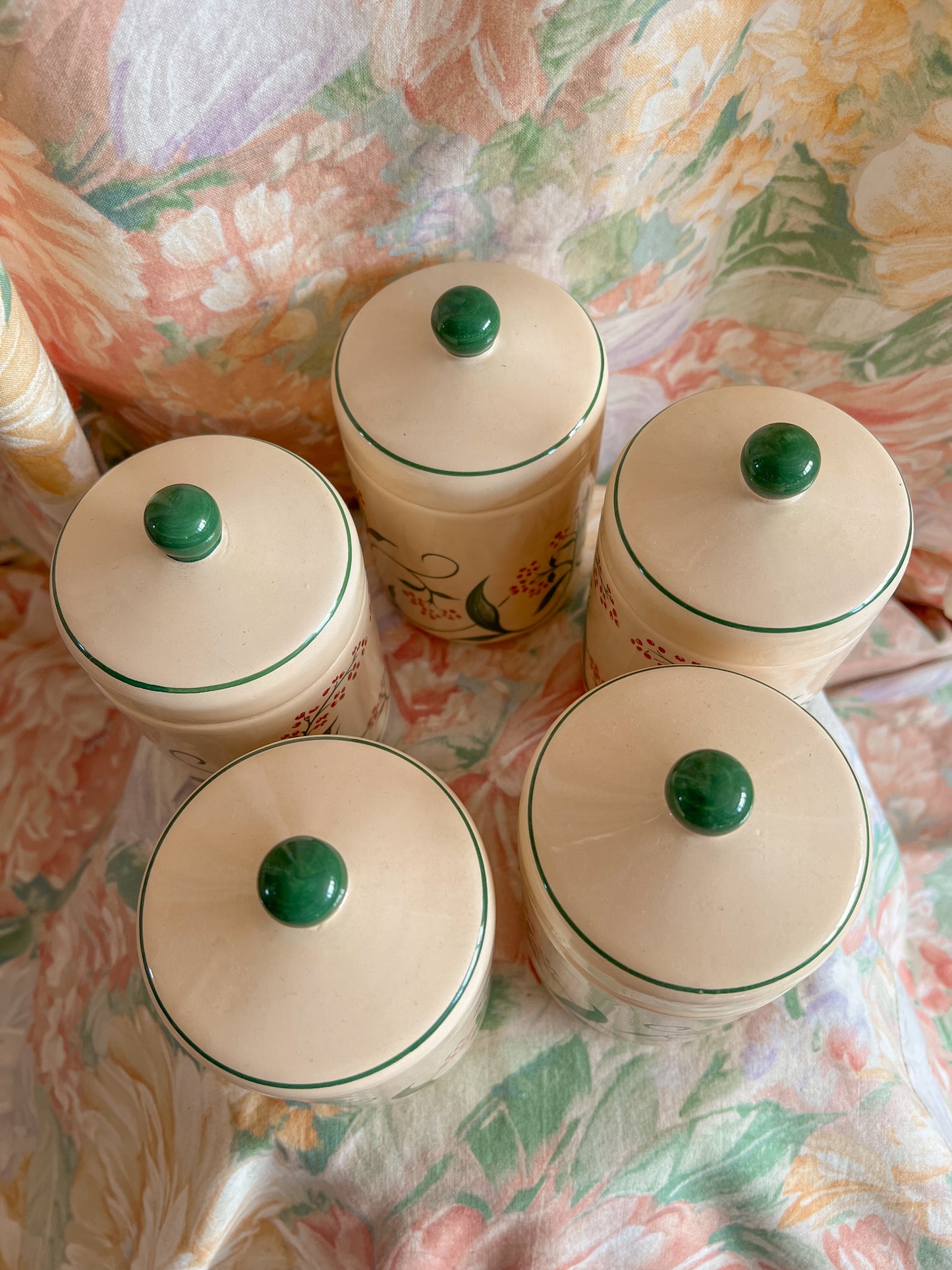 Set of five vintage kitchen canister jars.