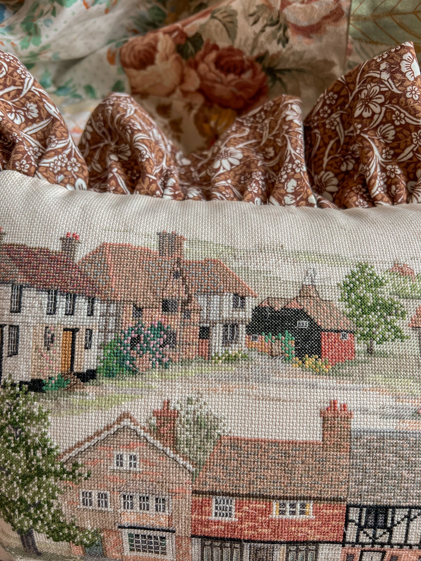 Vintage cottage needlepoint frill cushion.