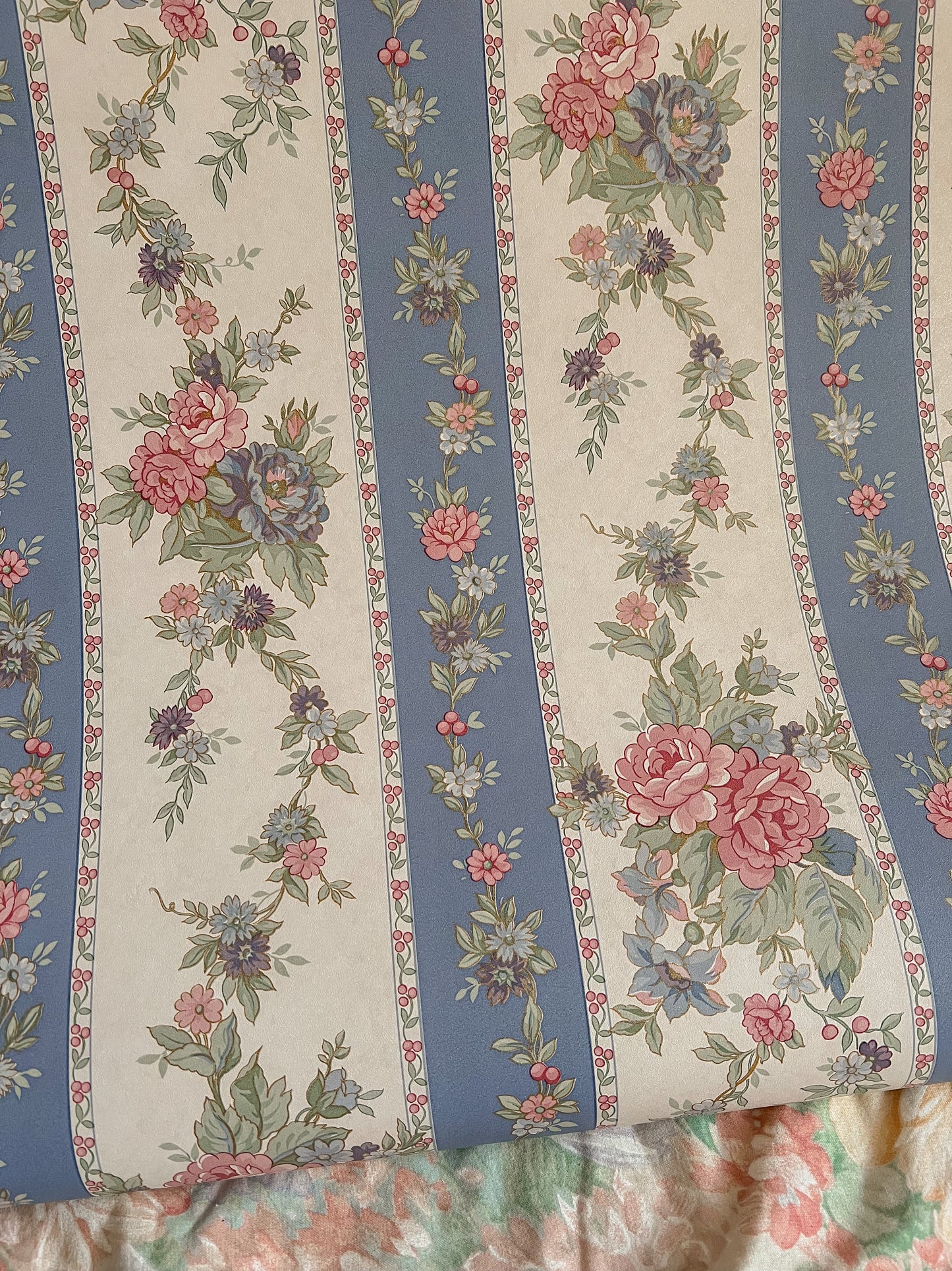 Vintage powder blue and pink stripe wallpaper.