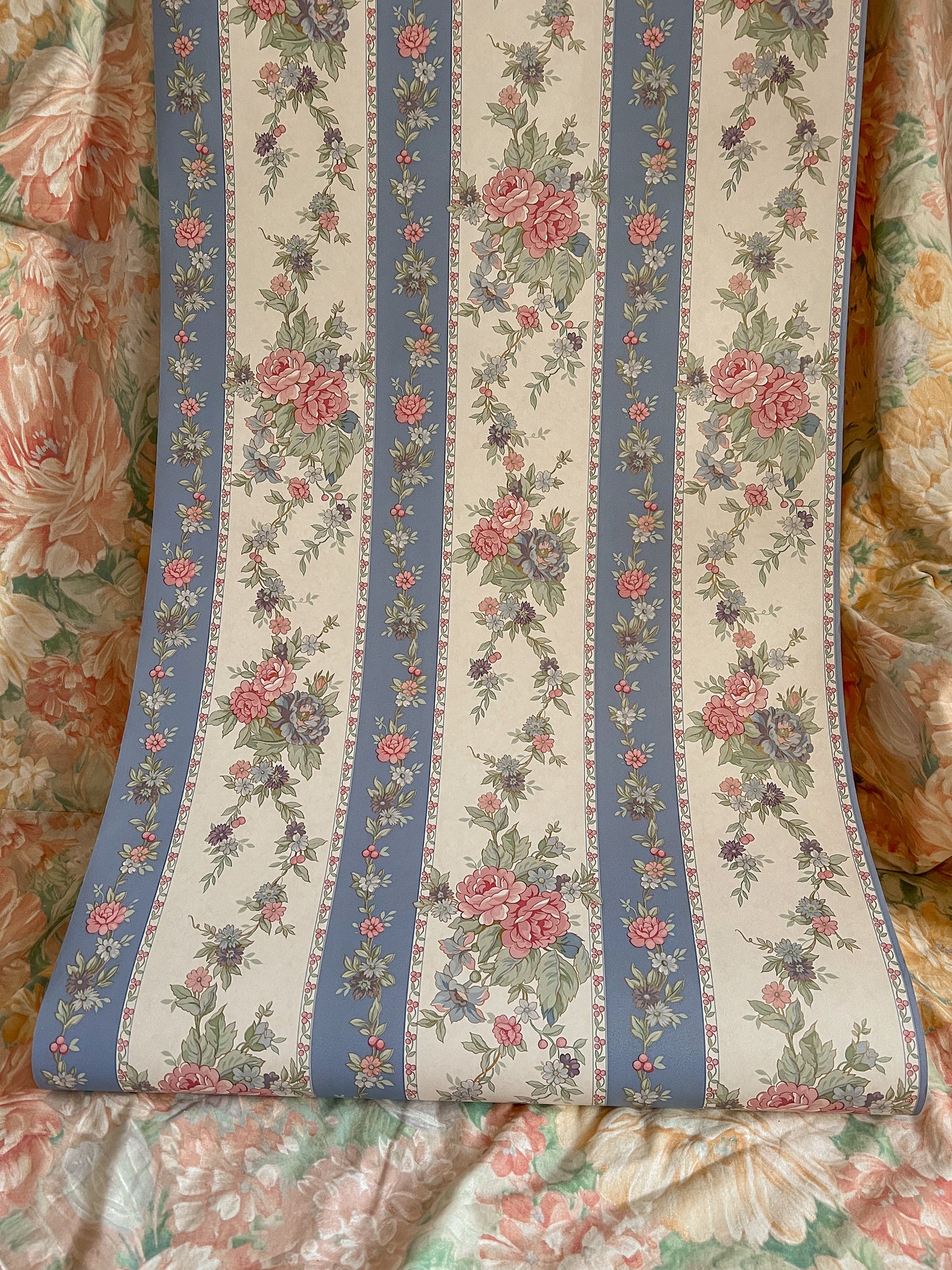 Vintage powder blue and pink stripe wallpaper.