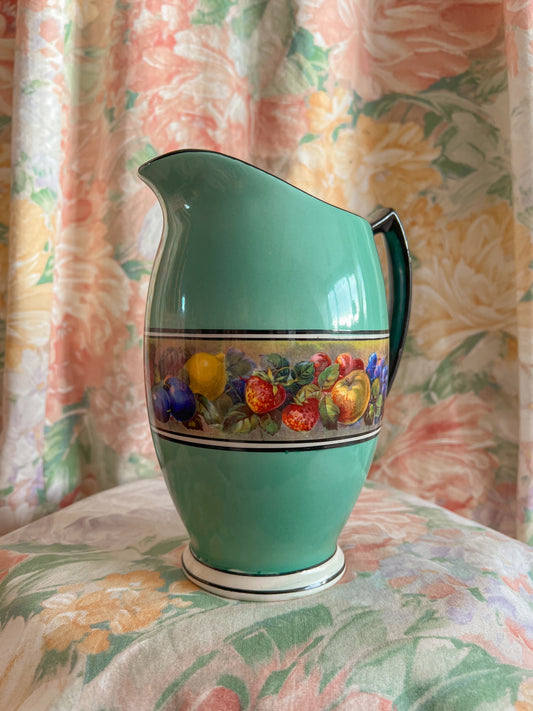 Vintage ceramic pitcher vase.