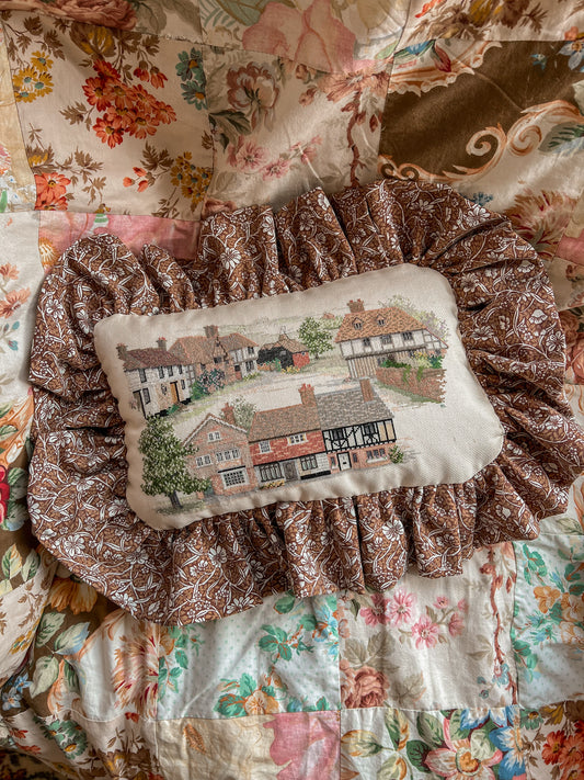 Vintage cottage needlepoint frill cushion.